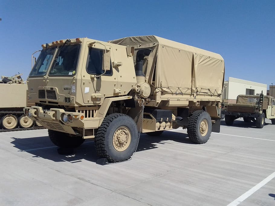 Marrón, foto de camión de guerra, durante el día, militar, Lmtv, defensa, Afganistán, estadounidense, armadura, artillería