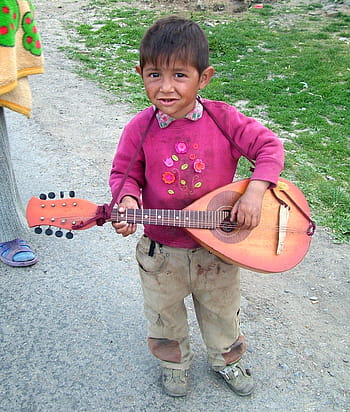 boy-musician-gypsies-transcarpathia-children-royalty-free-thumbnail.jpg