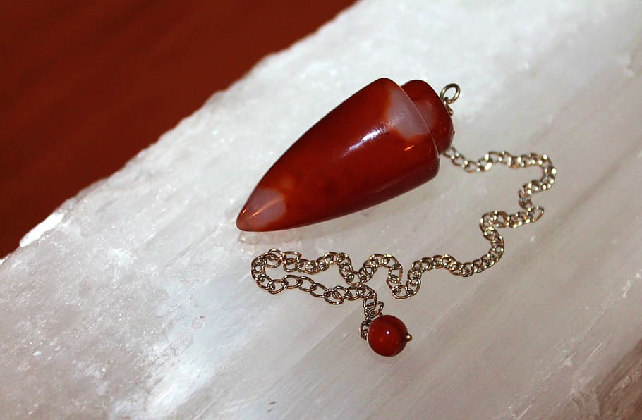 red, stone fragment pendant, gold-colored necklace, arrowhead, ruby, pendant, silver, chain, accessory, pendulum