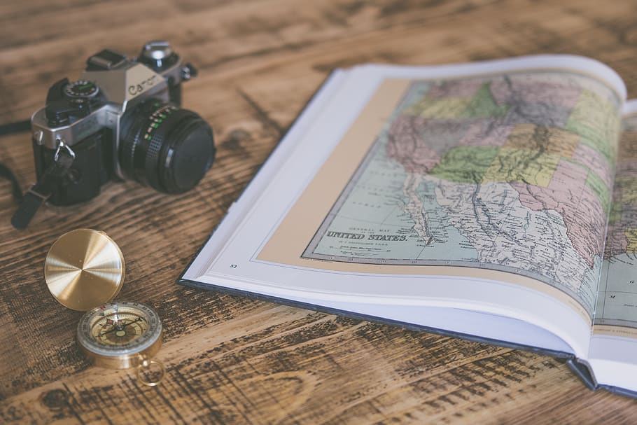 book, map, geography, compass, travel, camera, photography, blur, wooden, table