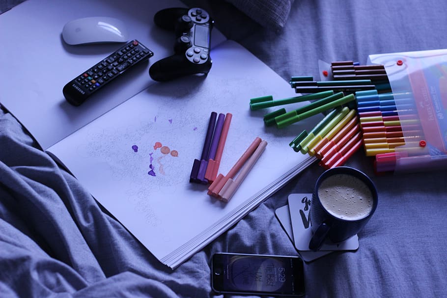 coloring pens, mouse, drawing, art, remote control, game controller, drawing book, phone, coffee, latte