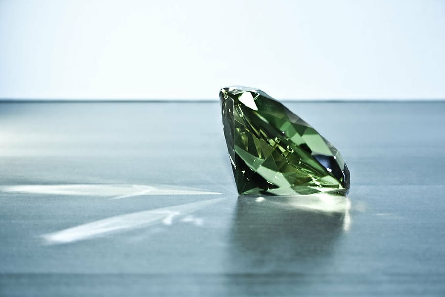 green, gemstone, black, surface, diamond, glass stone, grey, refraction, indoors, close-up