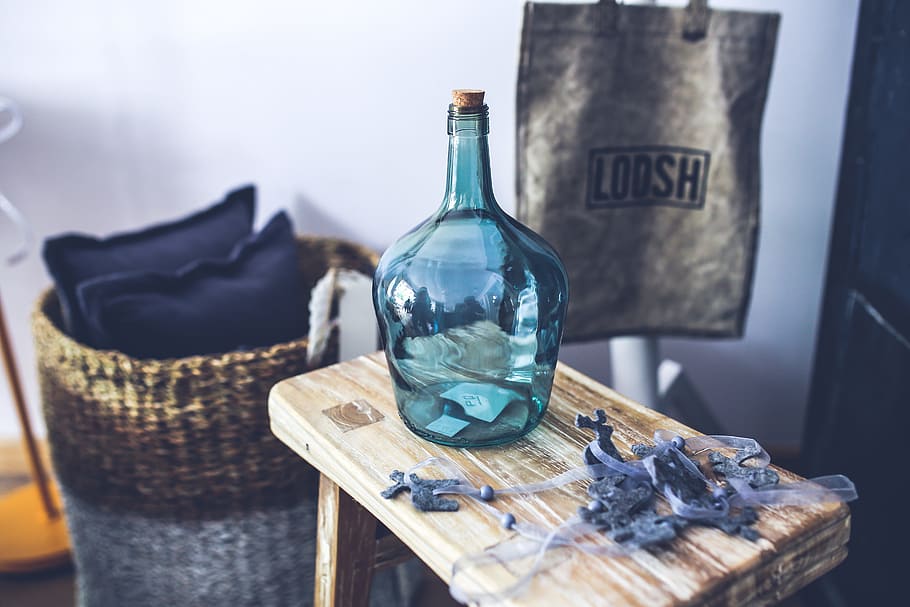 teal glass bottle, brown, wooden, saddle stool, carafe, wood, vintage, retro, dutch, scandinavian
