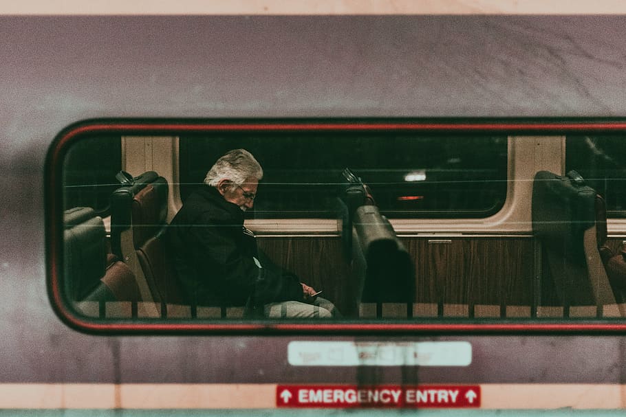 man, sitting, inside, vehicle, train, travel, transportation, people, elderly, old