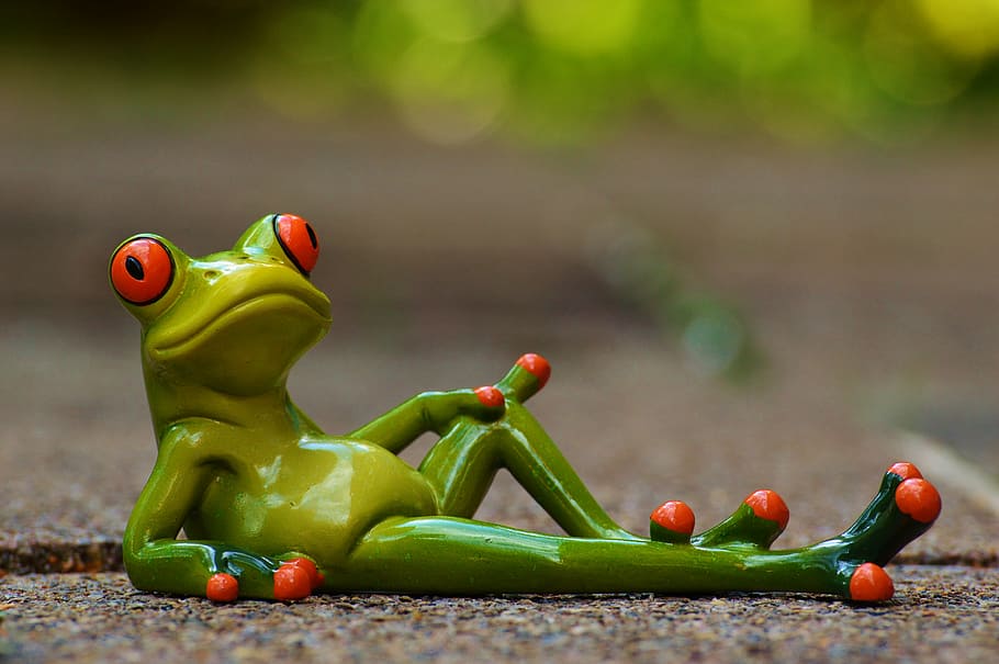 green, ceramic, frog figurine, lying, gray, concrete, road, closed, photography, frog