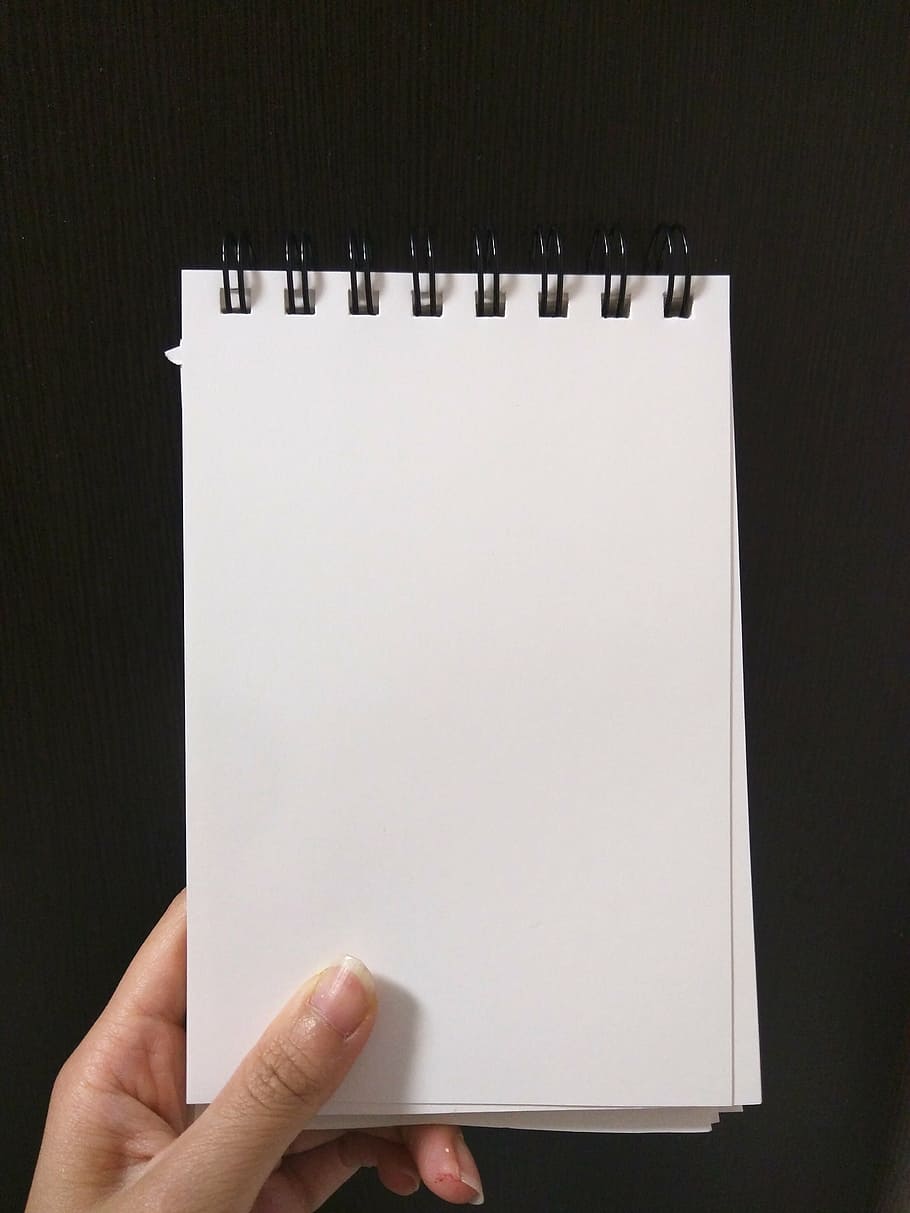 white printed paper, hand, note, memo, airplane, sketch book, white, paper, blank, copy space