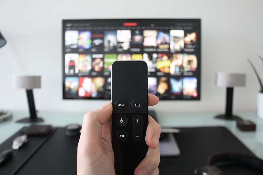 using, apple television, remote, control, movies, Man, Apple, Television, technology, equipment