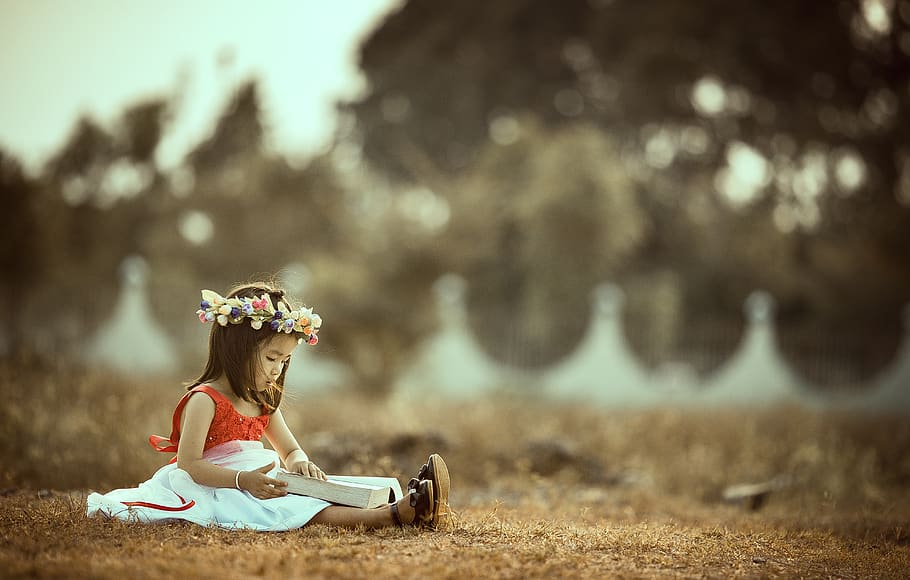 people, girl, child, kid, alone, grass, reading, book, bokeh, plant