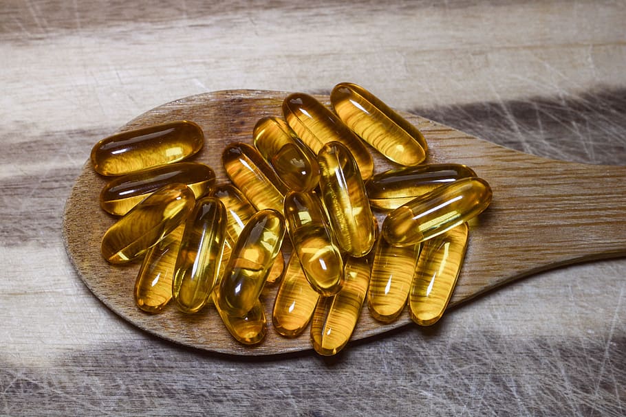 yellow, medication pill lot, pills, fish oil, fish, oil, omega, 3, gel, pharmaceutical
