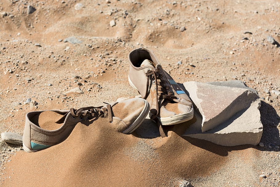 shoe, sneakers, sand, lost shoes, sports, footwear, sunlight, land, nature, shadow