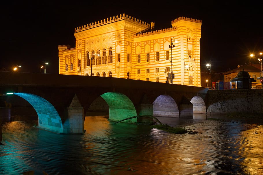 photography, gray, concrete, arch bridge, brown, building, nighttime, bosnia and herzegovina, bosnia, sarajevo