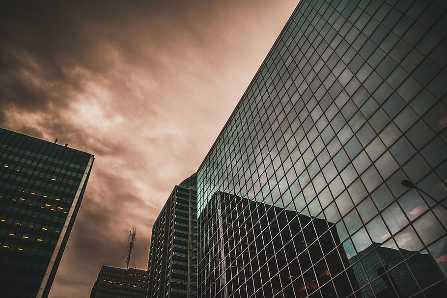 low, angle photography, glass building, architecture, building, infrastructure, city, urban, dark, clouds