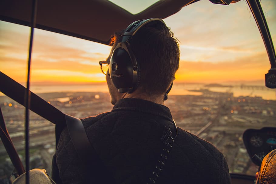 pilot, looking, window, helicopter, aerial, flying, flight, headphones, sunset, travel