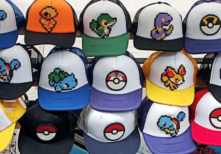 pile, assorted-color pokemon trucker hats, pokemon, hat, go, pokemon go, baseball, colours, colors, brim