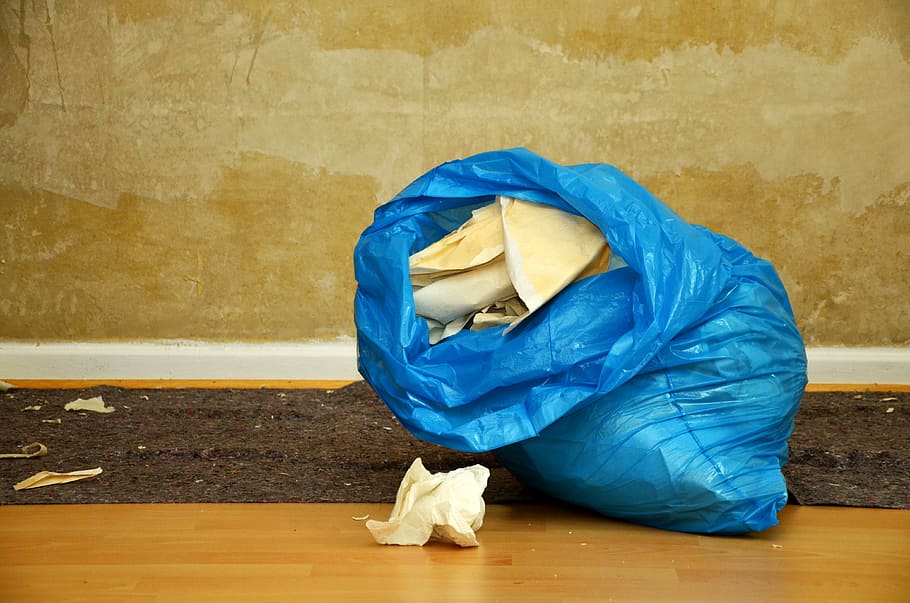 white, crumpled, paper, blue, plastic bag, inside, brown, room, in blue, renovate