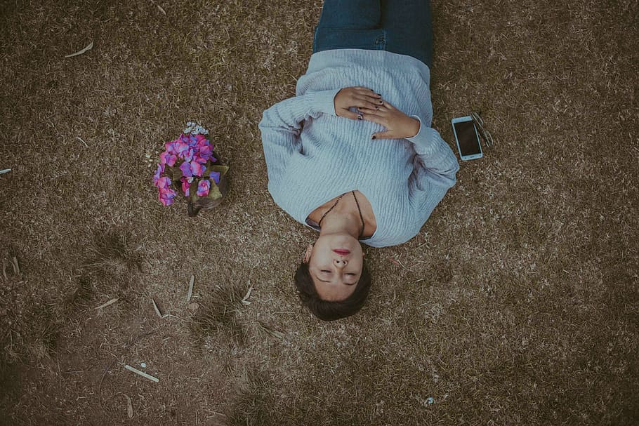 woman, lying, grass field, flower arrangement, android smartphone, people, female, outdoor, grass, sleep