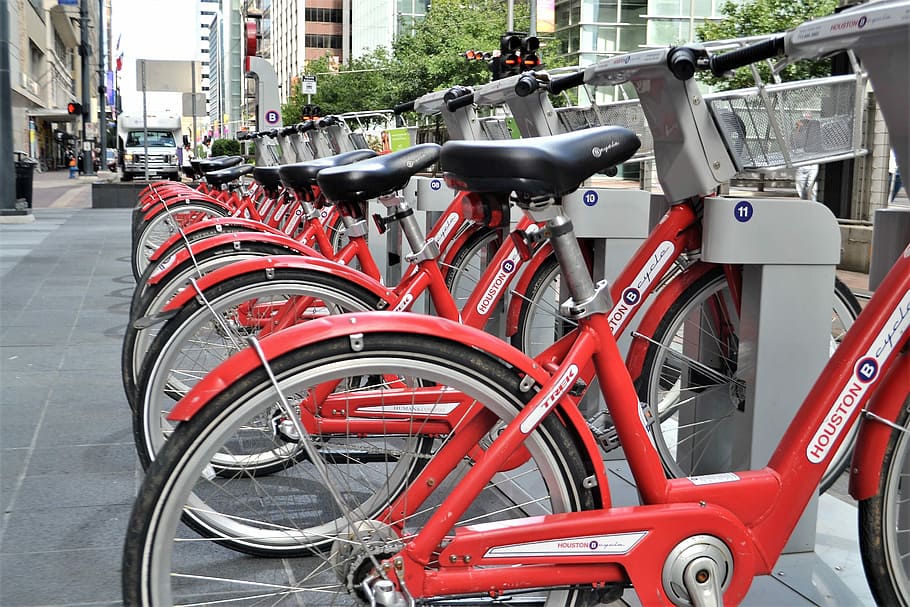 red, bicycle, parked, parking lot, wheel, transportation system, bike, street, lease, traffic