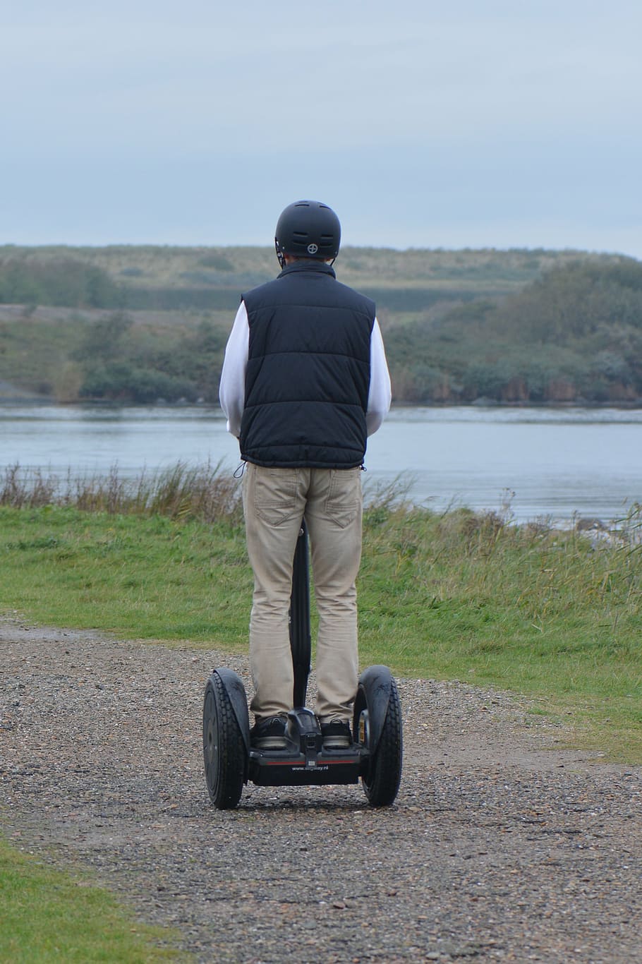 segway, getting there and getting around, man, rear view, real people, one person, leisure activity, lifestyles, transportation, full length