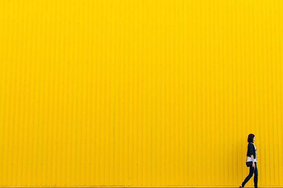 woman, walking, yellow, wall, building, architecture, girl, people, copy space, one person
