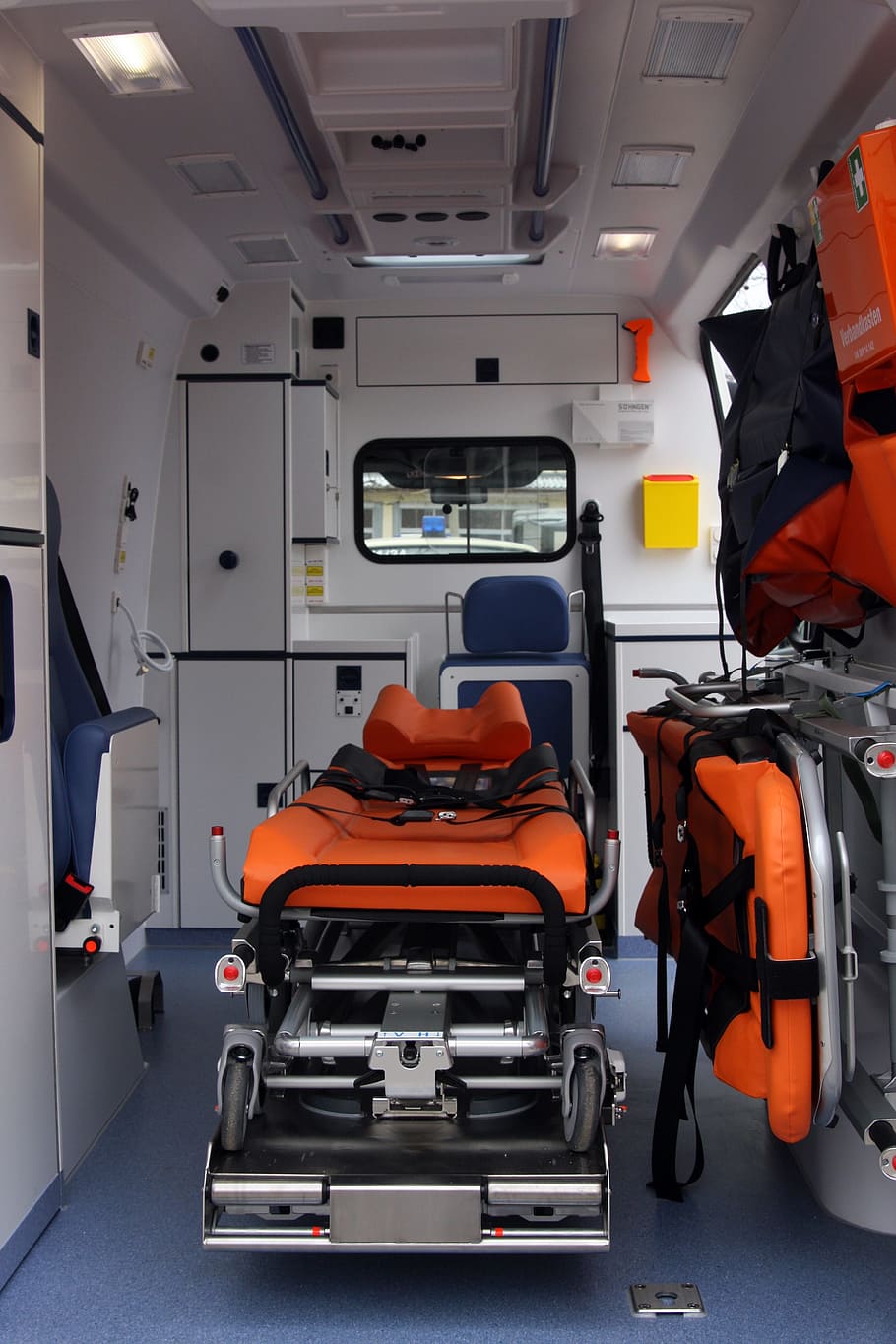 orange, black, stretcher, inside, ambulance, vehicle, medical, rescue, medic, emergency
