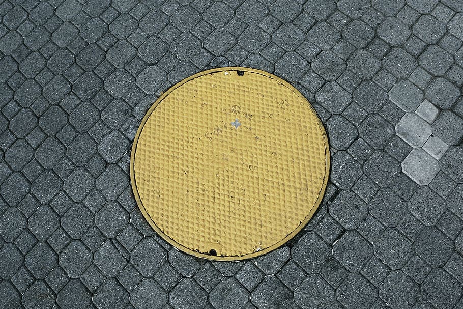 round, yellow, man hole, cover, frame, manhole, cobblestone, pattern, texture, textured