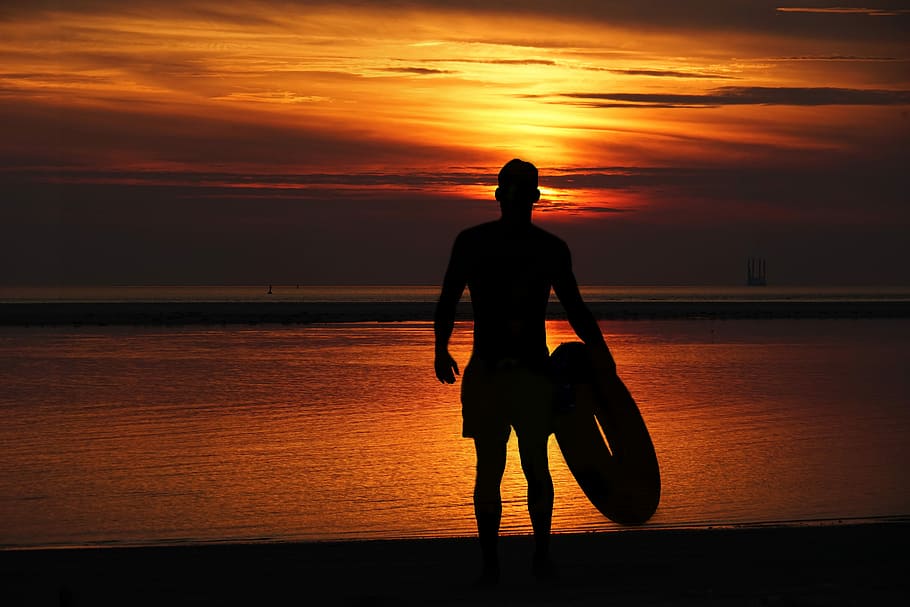 male, sunset, the sun, sea, the dawn family, beach, the silhouette, the coast, with backlight, the horizon