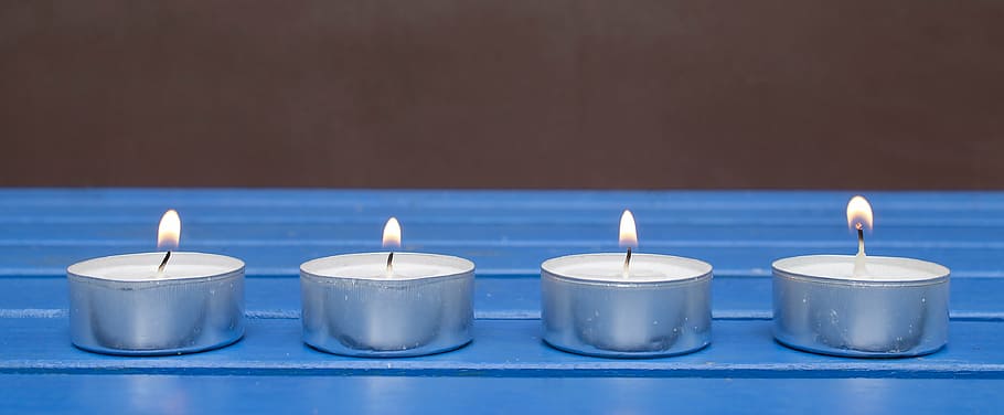 several, lit, round, votive, candles, blue, surface, candle, holiday, holidays