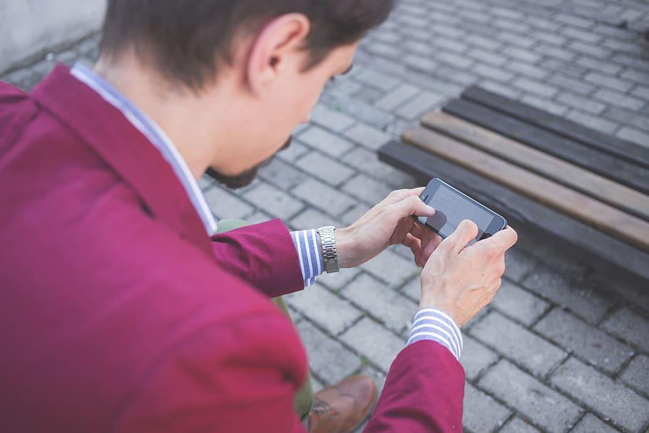 man, sitting, bench, using, smartphone, cobblestones, hands, mobile phone, person, wireless technology