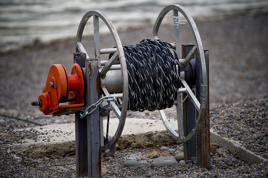 cable, cord, rope, rewinder, spool, manual, boat, beach, lake, land