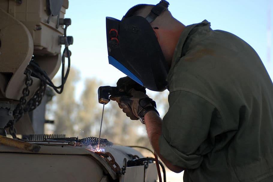man performing welding, construction, welding, welder, industry, worker, metal, military, person, labor