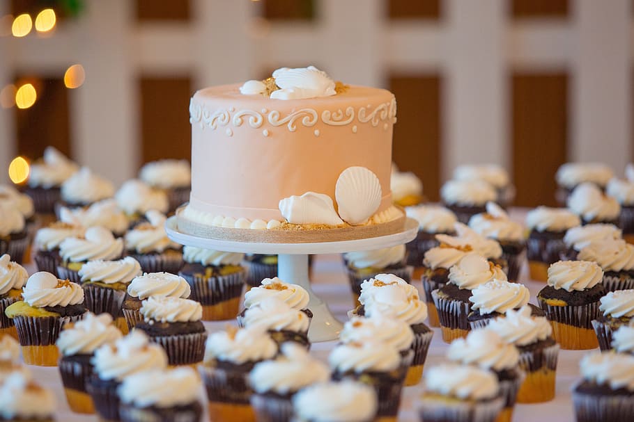 beige, fondant cake, surrounded, black, white, cupcakes lot, wedding, cake, cupcake, reception