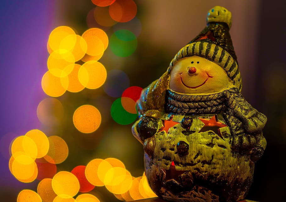 snowman figurine, bokeh light effects photo, santa claus, christmas, ornament, lights, statue, elf, representation, decoration