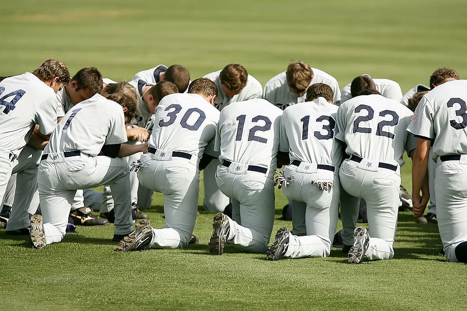 baseball players, gathered, field, baseball team, prayer, kneeling, pregame, athletics, players, grass