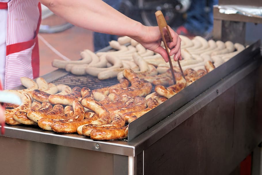 person grilling sausages, grill, bratwurst, barbecue, heat, grill sausage, meat, eat, grilling, food