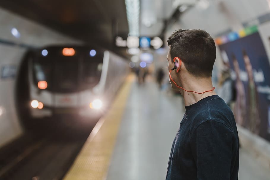 train, ariive, station, underground, subway, man, person, people, headphones, music