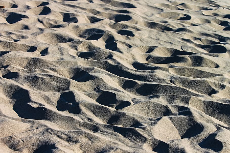 sand, beach, grains of sand, fine, wavy, structure, background, shadow, traces, sea