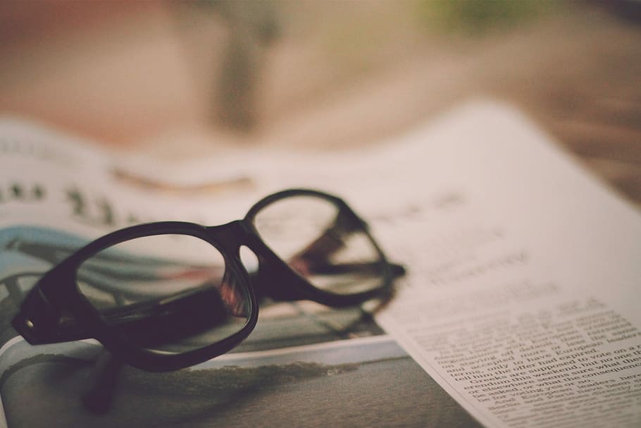 eyeglasses on newspaper, eyeglasses, newspaper, book, reading, document, business, page, close-up, sunglasses