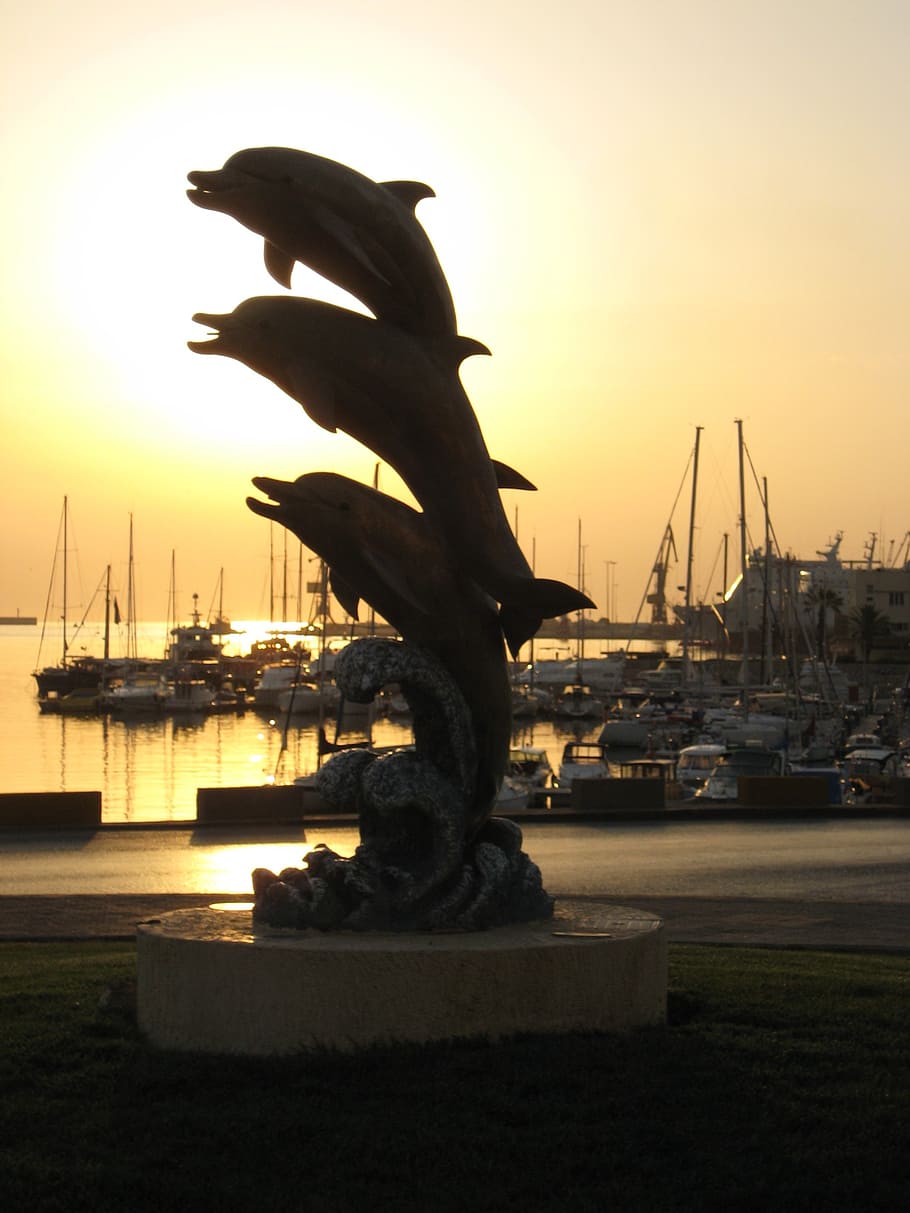 Heraklion, puerto, isla de Creta, delfines, amanecer, escultura, puerto veneciano, agua, puesta de sol, cielo