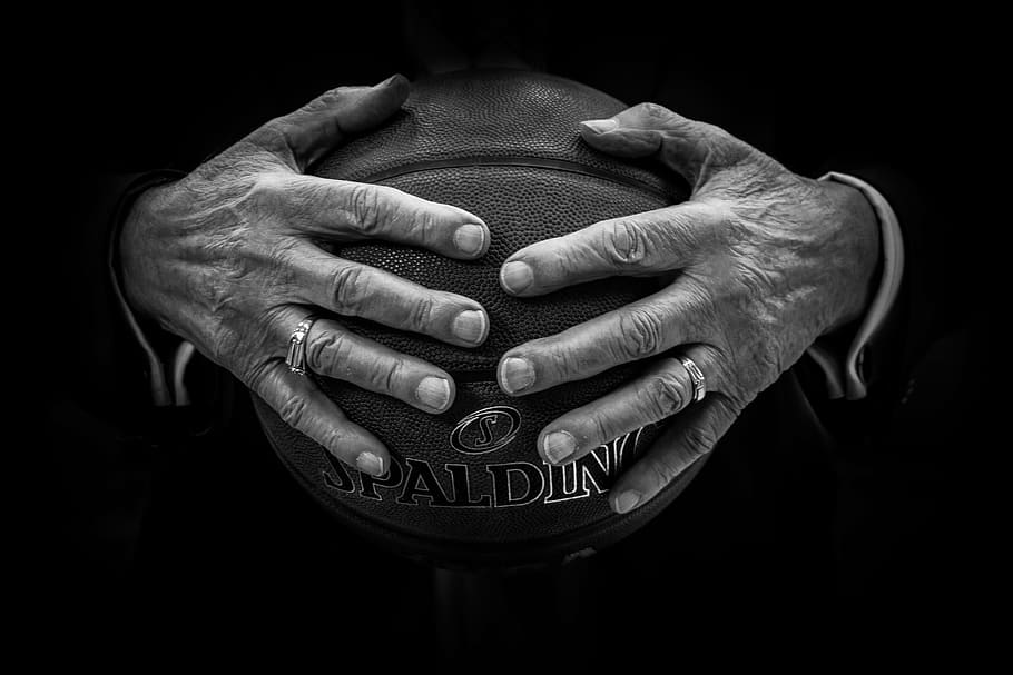 person, holding, brown, spalding basketball ball, ball, basketball, hands, rings, human hand, human body part