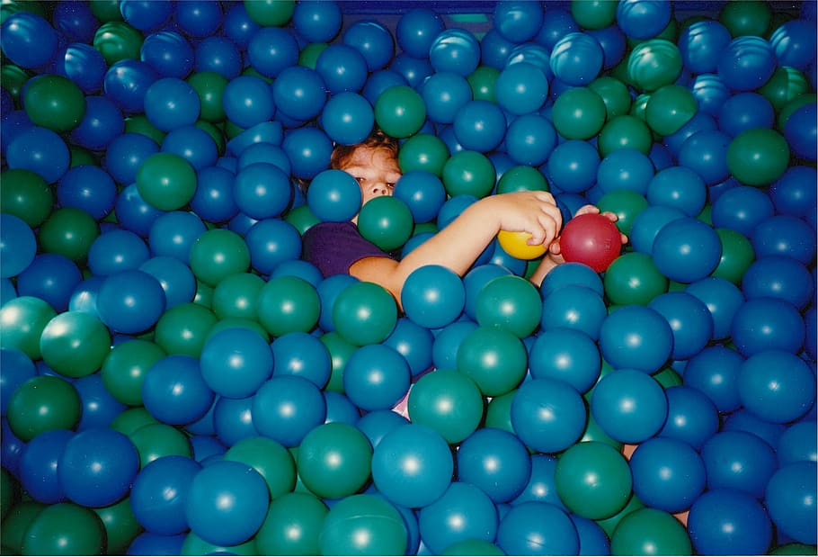 child, playing, balls, hiding, fun, sport, young, kid, girl, people