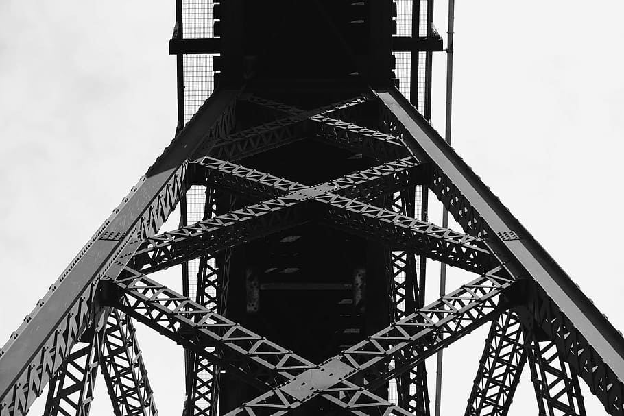low-angle photography, gray, metal building, grayscale, photography, tower, black and white, steel, bridge, beams