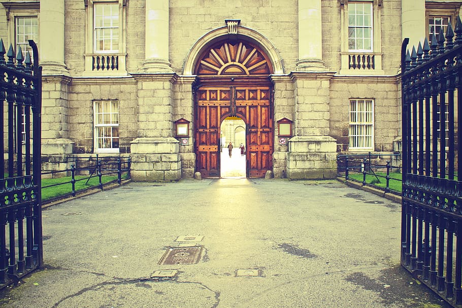 gray, concrete, building, front, black, metal gate, white, brown, Trinity College, Dublin