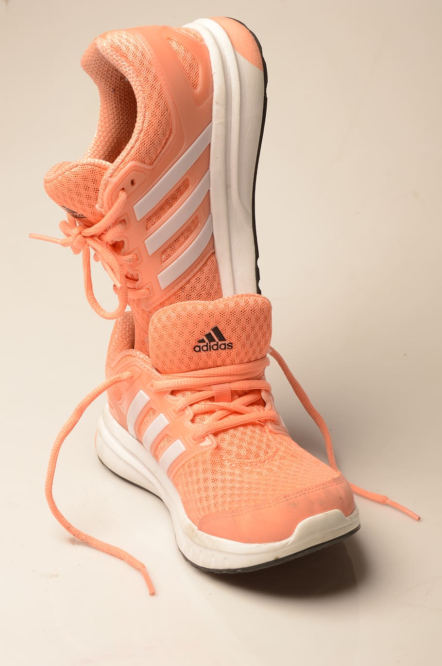 sports, brand adidas, still life, indoors, studio shot, shoe, white background, orange color, close-up, pair