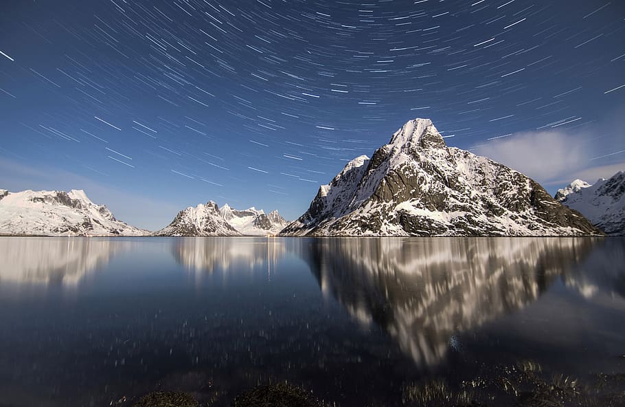 Norway, snow covered mountains, scenics - nature, star - space, water, mountain, beauty in nature, tranquil scene, sky, astronomy