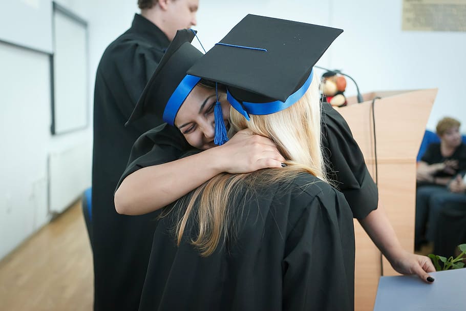 two, women hugs, graduation, graduation day, college graduation, college, graduate, college graduate, graduation ceremony, university