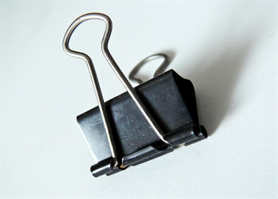clip, paperclip, office utensils, office supplies, steel clamp, spring clip, fortification, indoors, metal, close-up