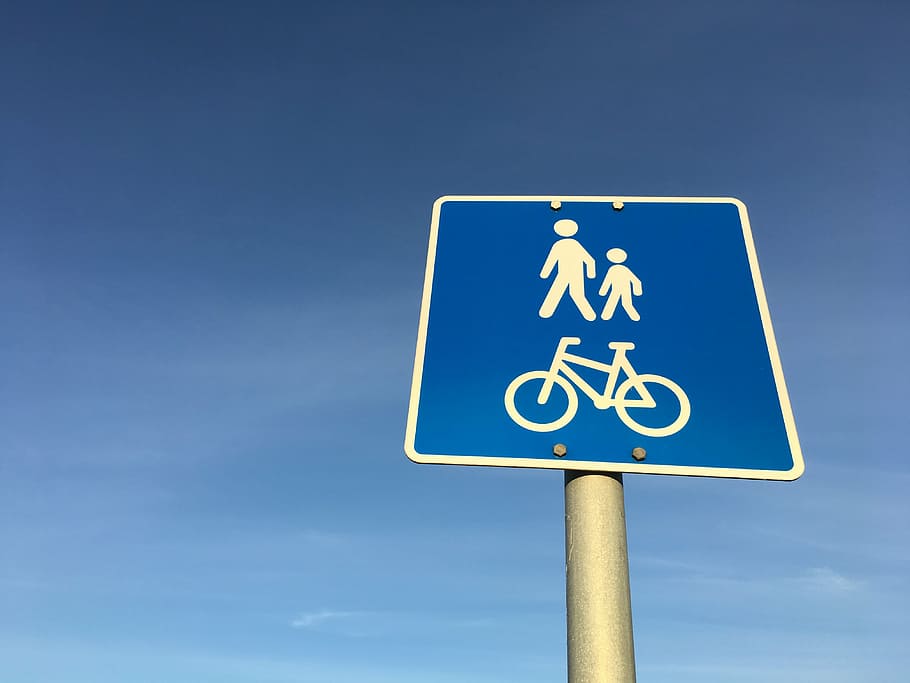 pedestrian, motorcyclist, walkway, signs, sign, blue, road Sign, symbol, sky, road