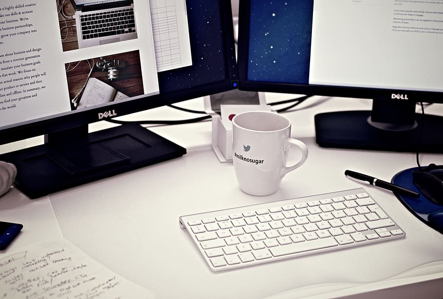 desktop, computer, keyboard, dual monitors, screens, mouse, peripherals, coffee, cup, mug