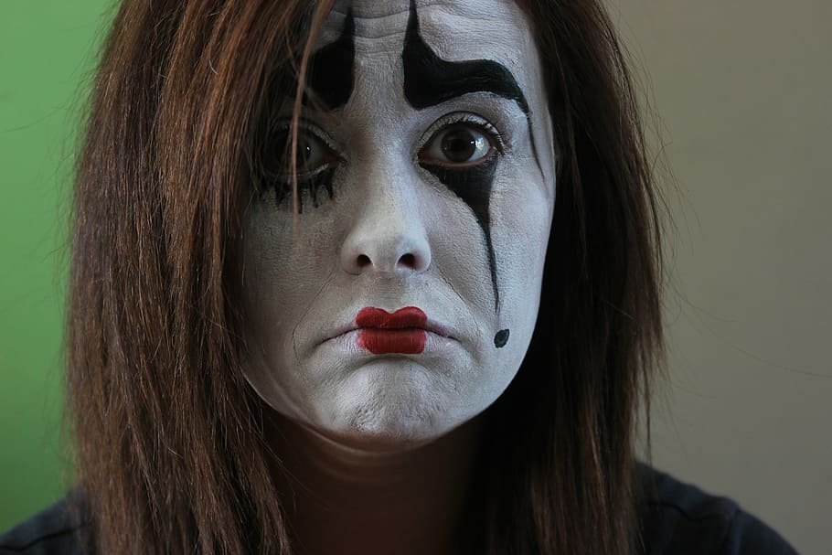 close-up photography, woman clown makeup, mime, brown eyes, face painting, make up, sad, face, crown, look up