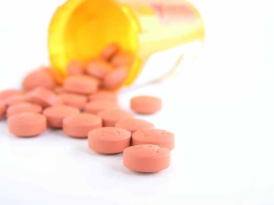 round, orange, pill lot, brown, plastic container, pills, prescription, bottle, medicine, medical